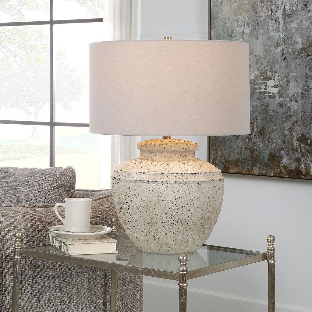 Introducing our Ceramic Table Lamp, inspired by the allure of antique pottery. Its aged stone finish, adorned with character distressing and dark undertones, exudes an air of timeless elegance. - Alternate Image