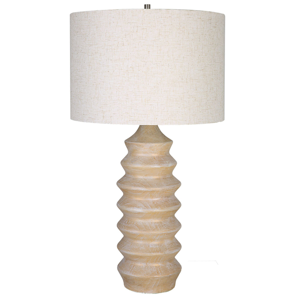 Introducing a captivating testament to modern sophistication. With a geometric carved base, featuring a stunning bleached wood tone look, this table lamp radiates timeless elegance.- Alternate Image