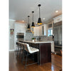 Crystorama Alston 10'' Pendant in Matte Black + Antique Gold - Lifestyle View