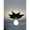 Crystorama Astro 12'' Flush Mount in Black - Lifestyle View