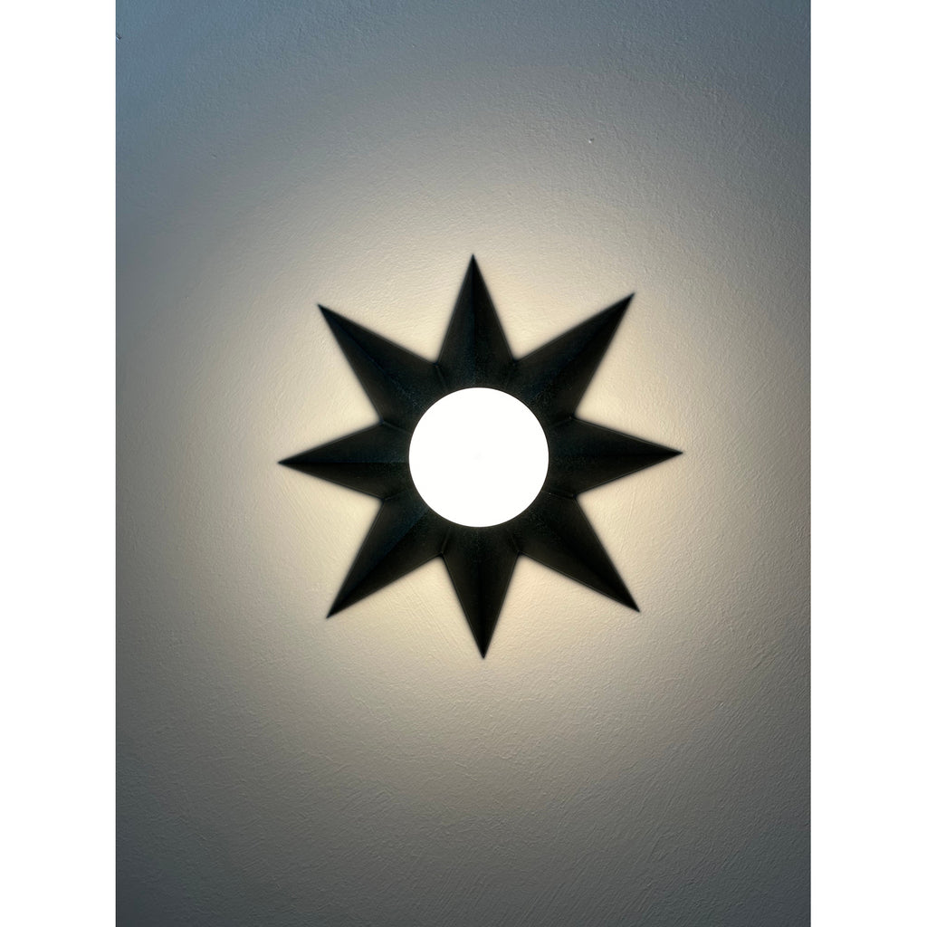 Crystorama Astro 12'' Sconce in Black - Lifestyle View