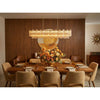 Crystorama Addis 65'' Linear Chandelier in Aged Brass - Lifestyle View