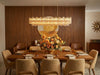 Crystorama Addis 65'' Linear Chandelier in Aged Brass - Lifestyle View