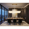 Crystorama Addis 65'' Linear Chandelier in Aged Brass - Lifestyle View