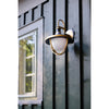 Crystorama Atlas 9.75'' Outdoor Sconce in Matte Black + Textured Gold - Lifestyle View