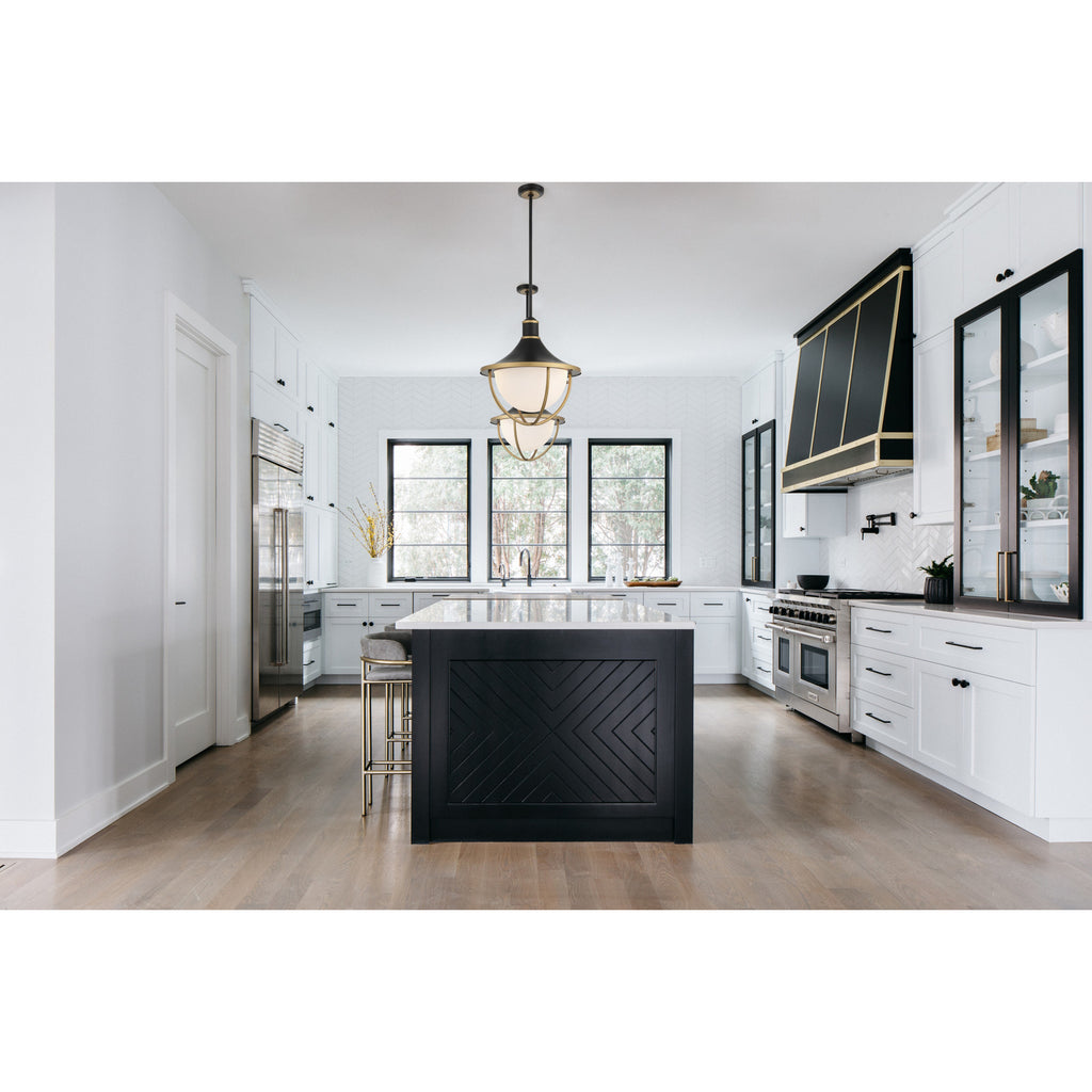 Crystorama Atlas 16.5'' Outdoor Pendant in Matte Black + Textured Gold - Lifestyle View