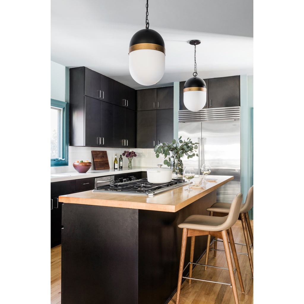 Crystorama Capsule 8'' Outdoor Pendant in Matte Black + Textured Gold - Lifestyle View