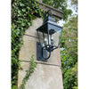 Crystorama Dumont 14.5'' Outdoor Sconce in Graphite - Lifestyle View