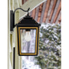 Crystorama Hawkins 7.25'' Outdoor Sconce in Matte Black + Textured Gold - Lifestyle View