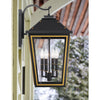 Crystorama Hawkins 12'' Outdoor Sconce in Matte Black + Textured Gold - Lifestyle View
