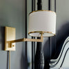 Crystorama Madison 10'' Task Sconce in Aged Brass - Lifestyle View