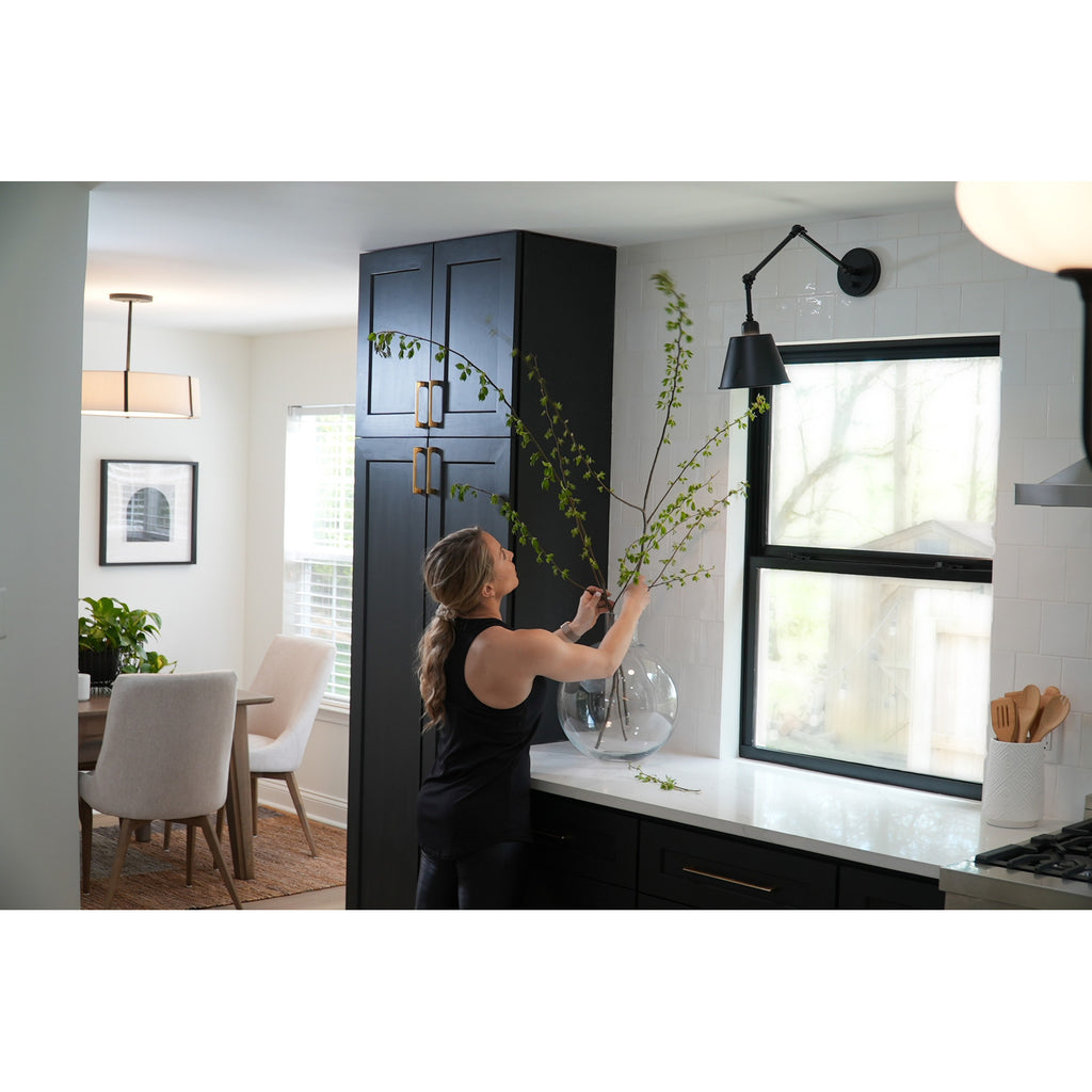 Crystorama Mitchell 7.25'' Task Sconce in Matte Black - Lifestyle View