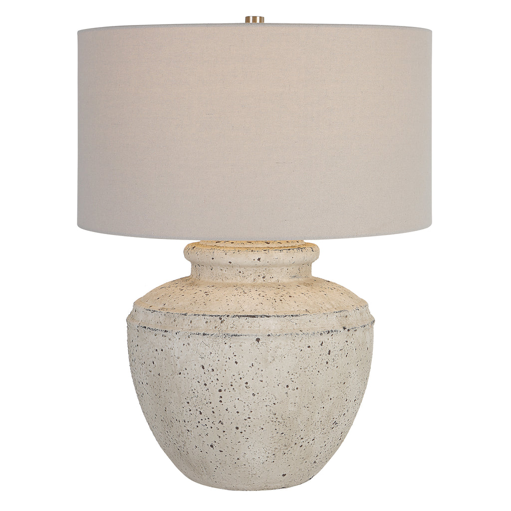 Introducing our Ceramic Table Lamp, inspired by the allure of antique pottery. Its aged stone finish, adorned with character distressing and dark undertones, exudes an air of timeless elegance.