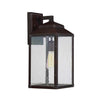 Our outdoor wall lantern is the perfect addition to your home's outdoor areas. With a classic and stylish dark English bronze finish and gold accents, this lantern features a clean and uncluttered silhouette that showcases beautiful clear, seeded glass panels.